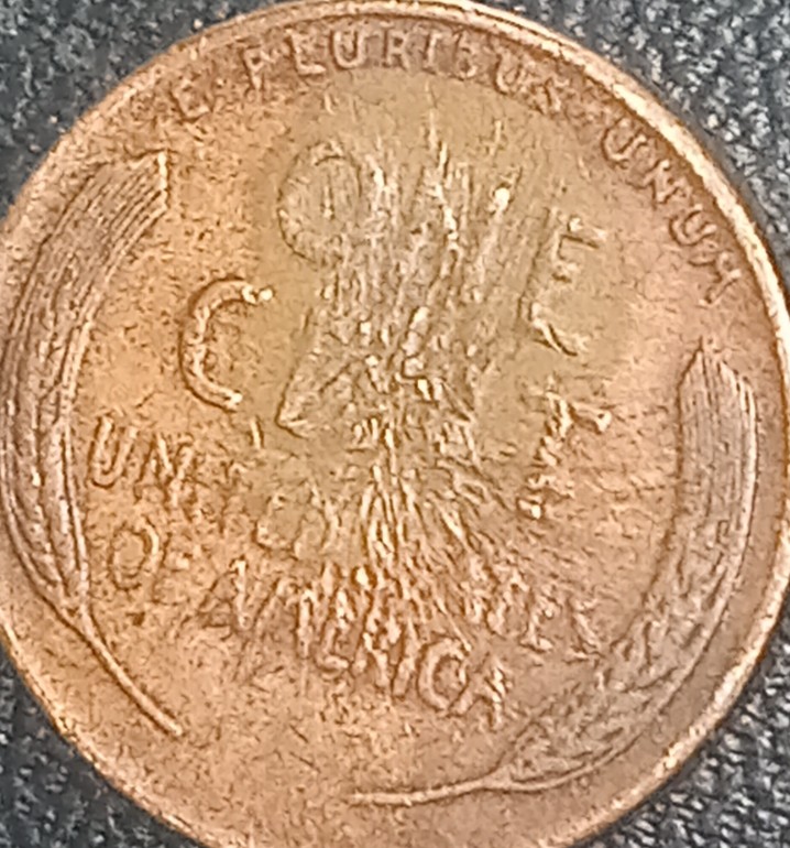 1955-D-Wheat-Penny-Looks-Like-Something-During-Mint-N-Some-After-Huh?