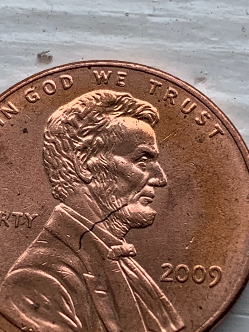 2009-Penny--Line-From-Cheek-To-Collar-Look-Like-An-Ink-I-Soak-It-In-Alcohol-But-Didn't-Come-Out?