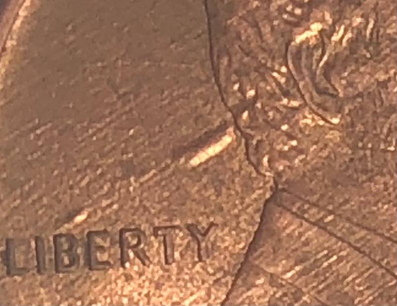 Found-1994-Penny-Looks-Like-A-Bullet-Going-In-Or-Out-Lincoln-Head-?