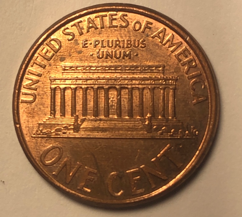 1999-Penny-Offcenter-And--Clamshell-And-Name-Above-We?