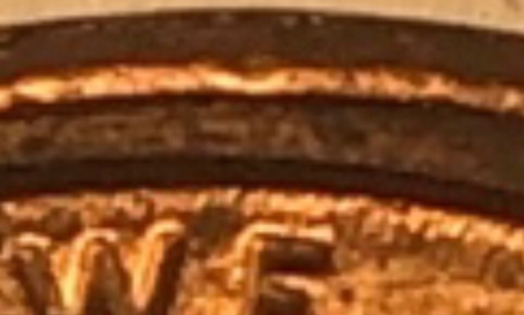 1999-Penny-Offcenter-And--Clamshell-And-Name-Above-We?