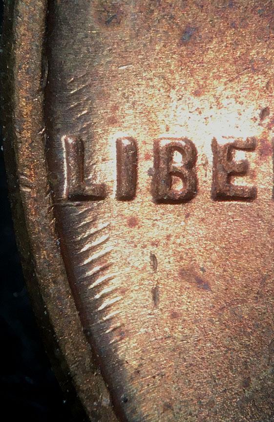 1950-Lincoln-Wheat-Cent-Mint-Error---Odd-Parallel-Lines-Raised-By-Liberty