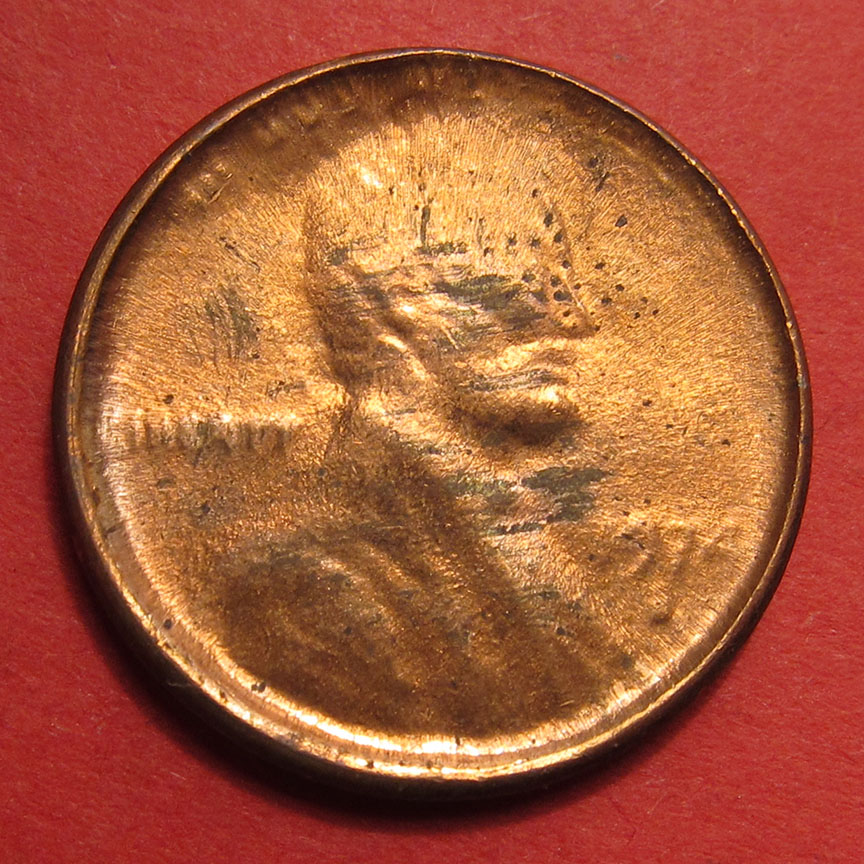 1974-D-Lincoln-Memorial-Cent-Mint-Error---Struck-Through-Die-Cap-4-Coin-Progression