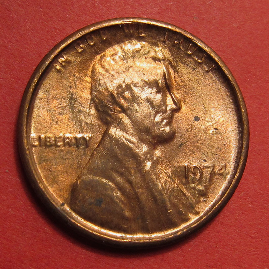 1974-D-Lincoln-Memorial-Cent-Mint-Error---Struck-Through-Die-Cap-4-Coin-Progression