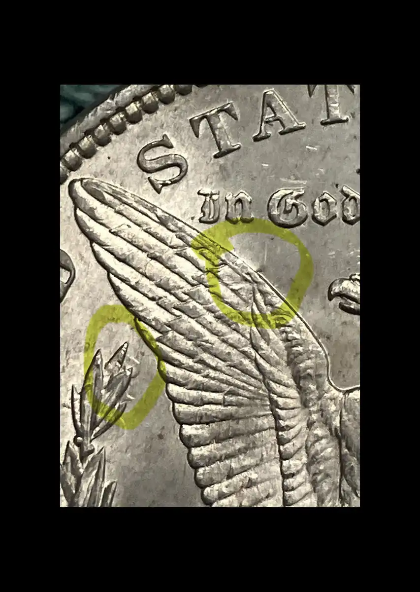 1889-P-With-Vertical-Line-On-Left-Wing---VAM19A?
