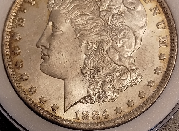 1884-O-Morgan-Dollar-In-Older-Slab