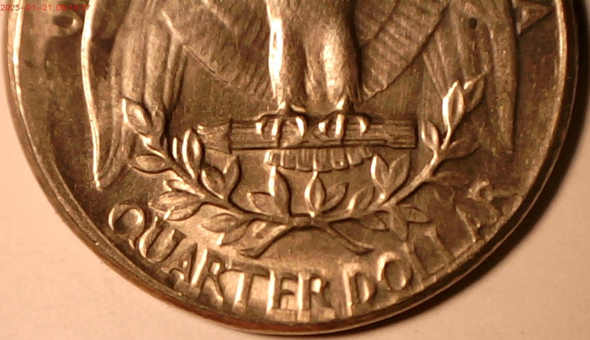 1965-Quarter-With-A-Tilted-Partial-Collar-And-Extrusion-Strike-On-Reverse-?