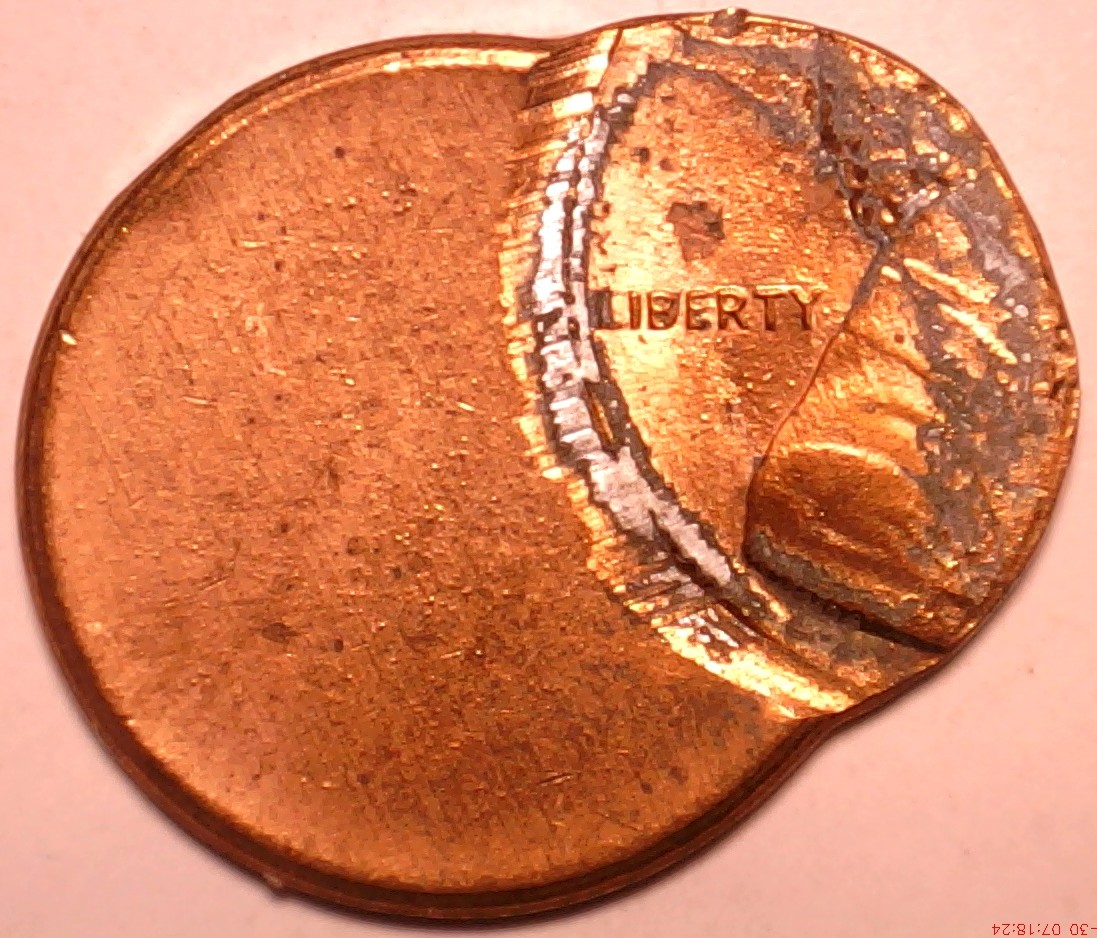 Lincoln-Cent-Struck-Off-Center-With-A-Reverse-Clash