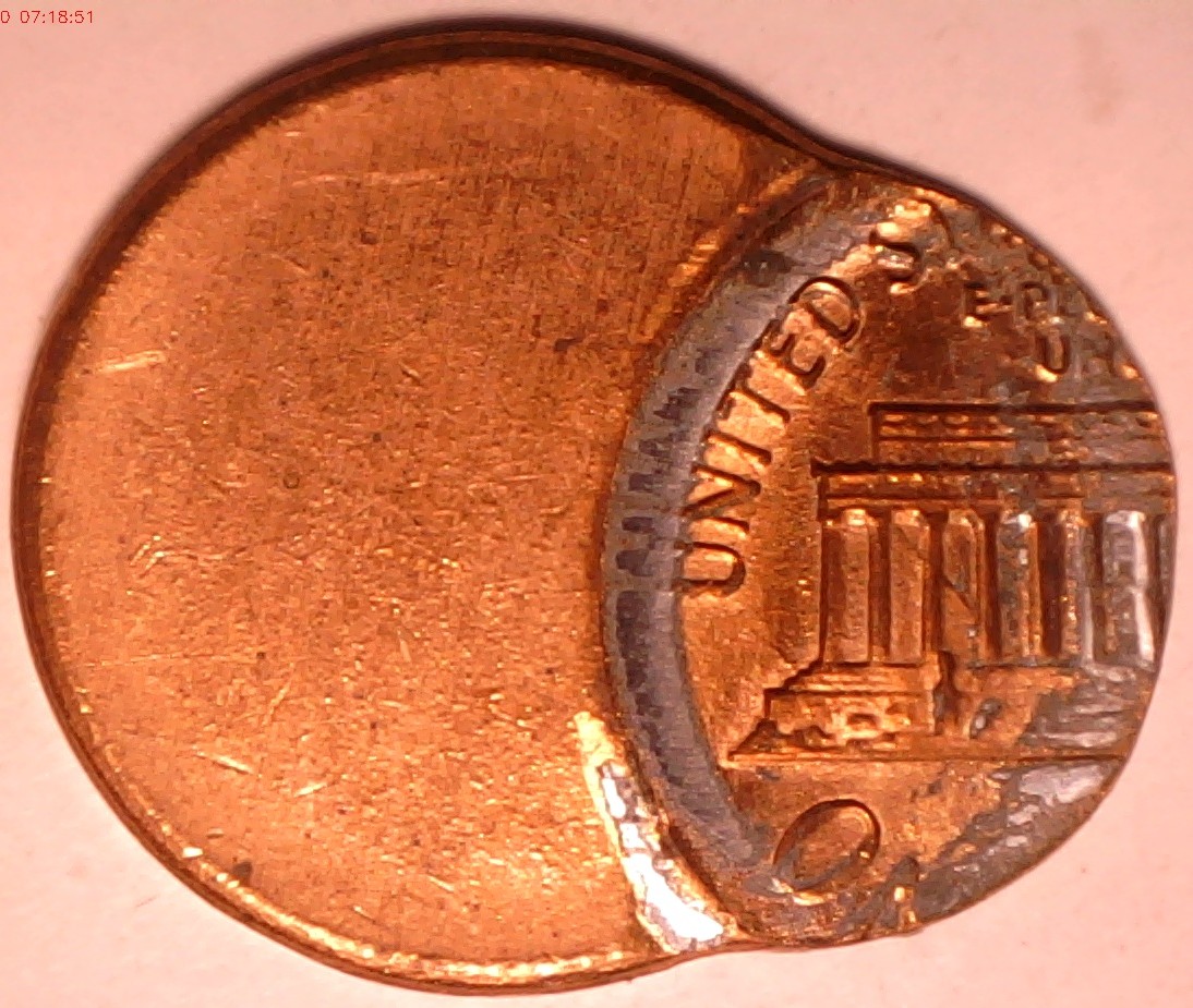 Lincoln-Cent-Struck-Off-Center-With-A-Reverse-Clash