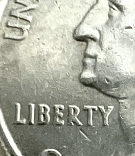Has-Anyone-Found-A-2000-New-Hampshire-Quarter-With-Missing-L?