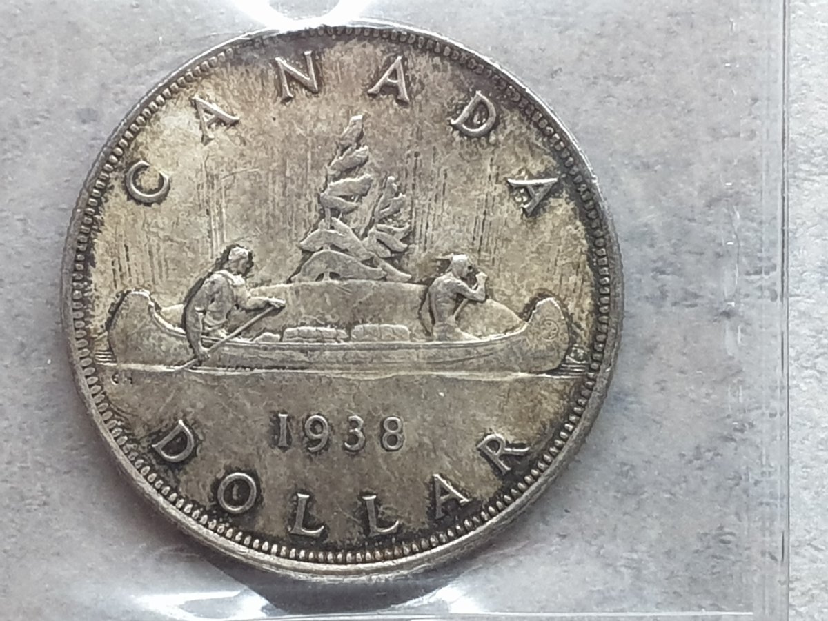 Opinions-On-This-ICCS-Graded-1938-Silver-Dollar