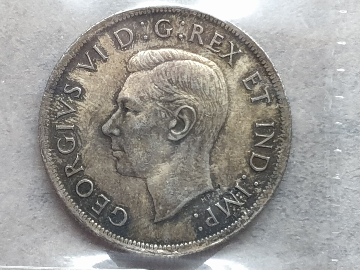 Opinions-On-This-ICCS-Graded-1938-Silver-Dollar