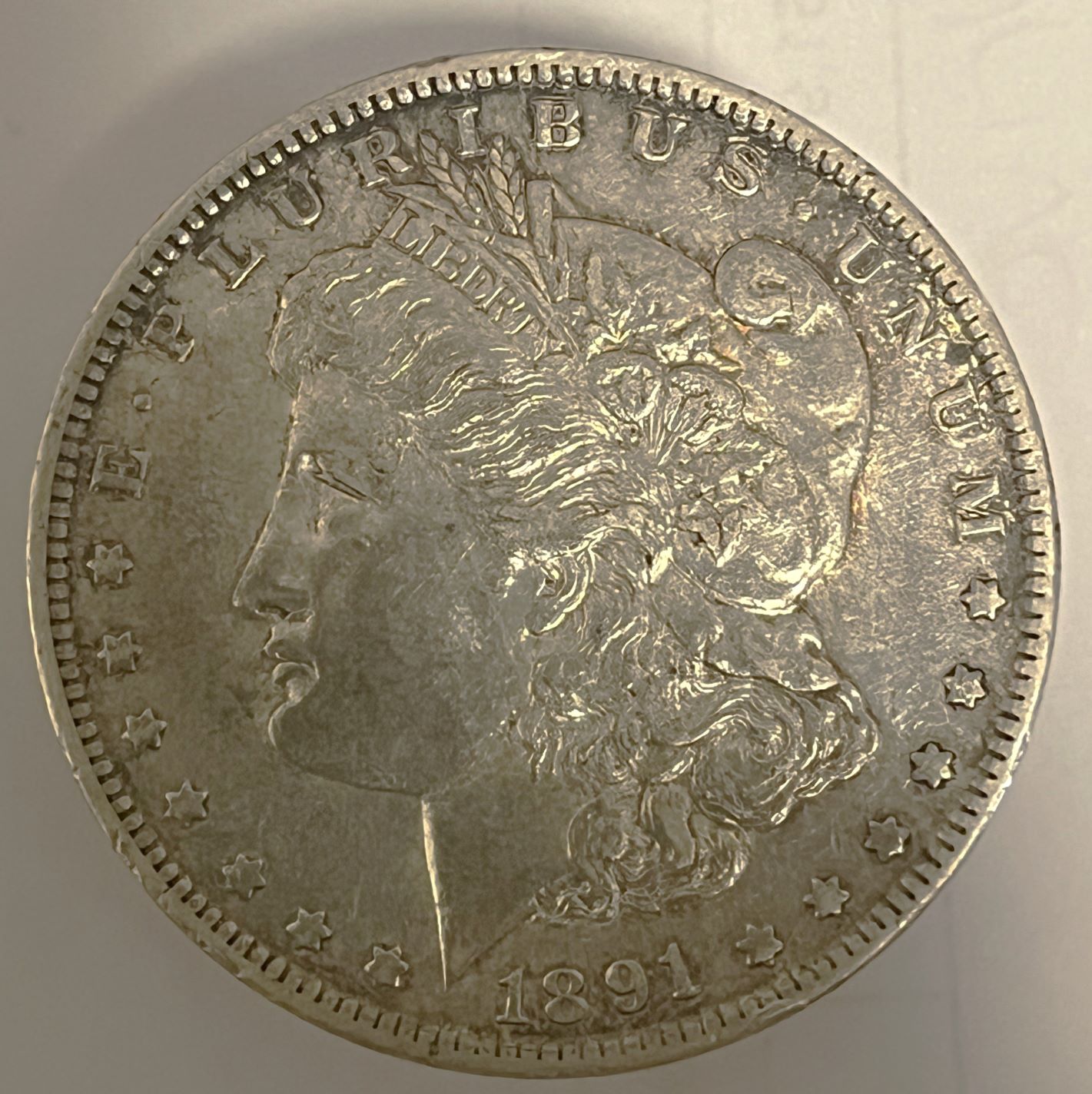 1891-O-Morgan,-Grade?-Cleaned?