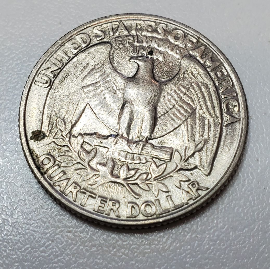 1983-P-Quarter-Strike-Through-Or-Dryer-Coin-Or-Worn-Die?