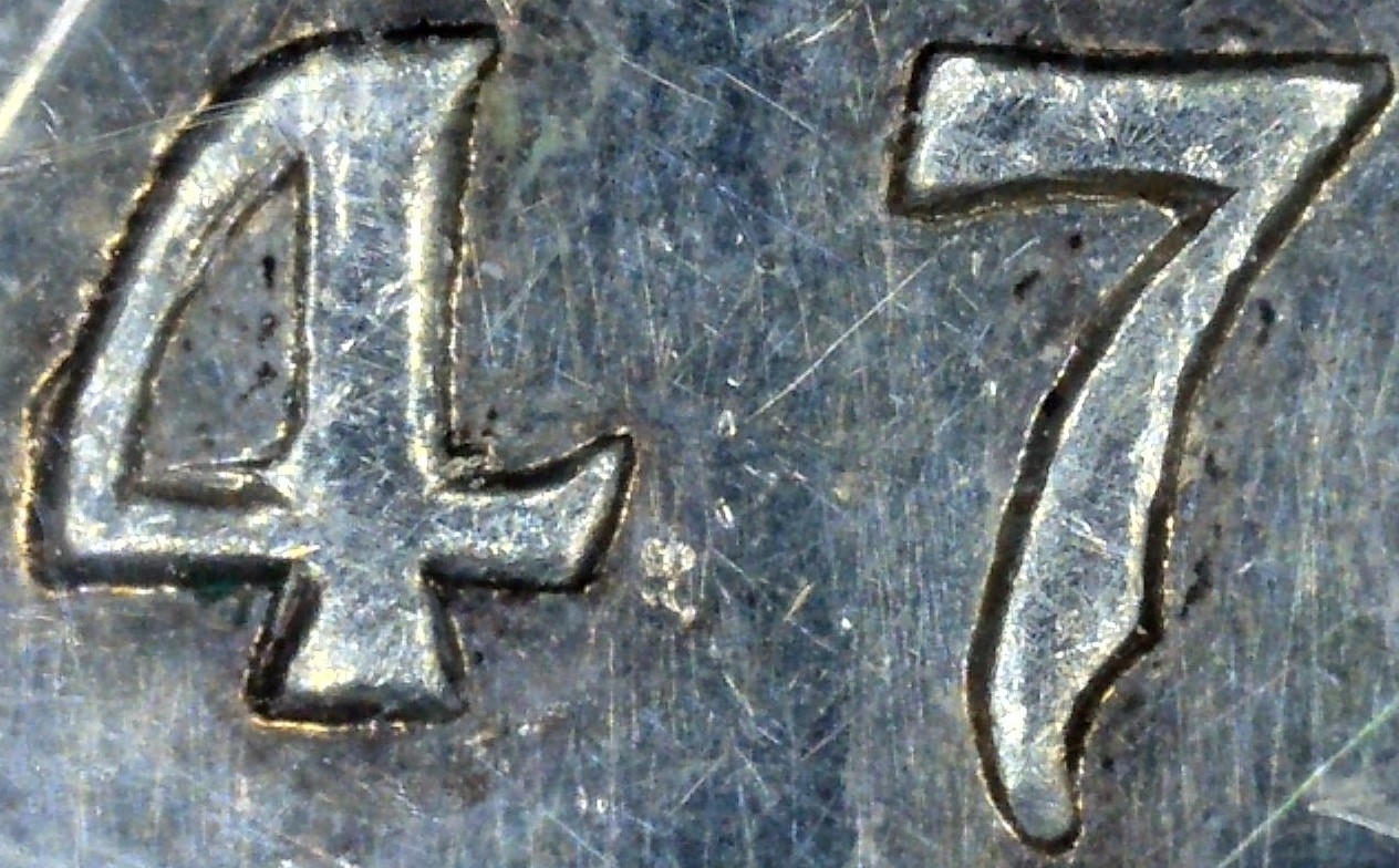 1947-Canadian-Dollar-Pointed-7-4/4?-No-Value-On-Coins-Canada?