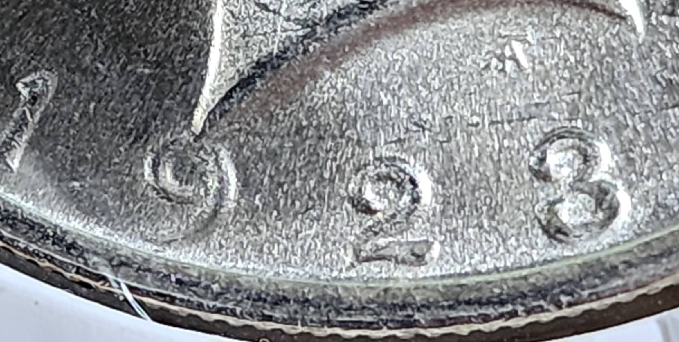 1928-Or-1923-Peace-Dollar?-I'm-Not-Sure.