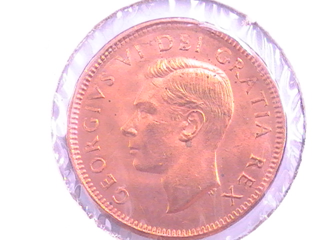 1949-Canada-Cent-Punched-On-Foreign-Planchet