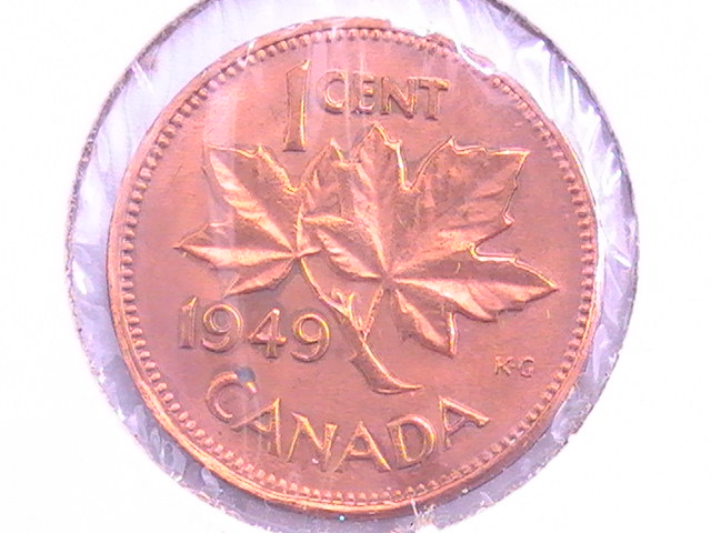 1949-Canada-Cent-Punched-On-Foreign-Planchet