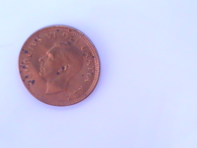 1949-Canada-Cent-Punched-On-Foreign-Planchet
