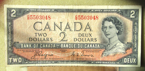 Canadian-1954-$1.00-Bill,-Devils-Face-With-Huge-Ink-Smear-On-Reverse.