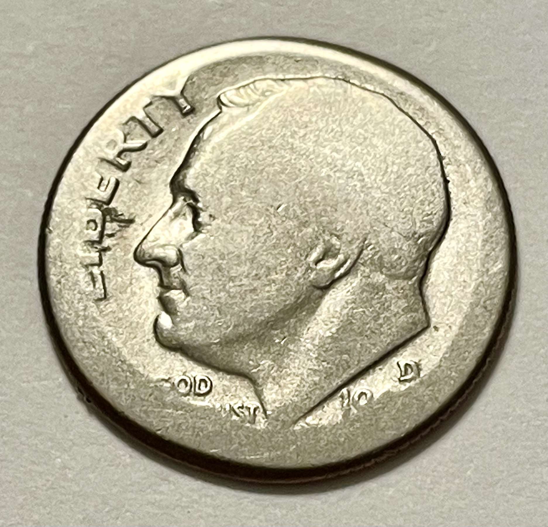 Unknown-Date-Clad-Roosevelt-Dime---Strike-Error-Or-PMD?