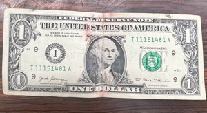 I-Could-Use-Some-Help-With-This-One-Dollar-I-Found.