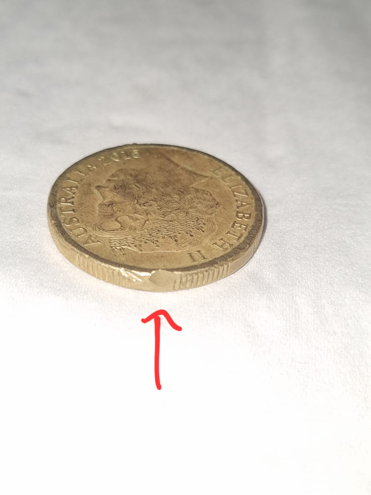 Is-This-An-Error-Or-Damaged-$1-Australian-Coin?