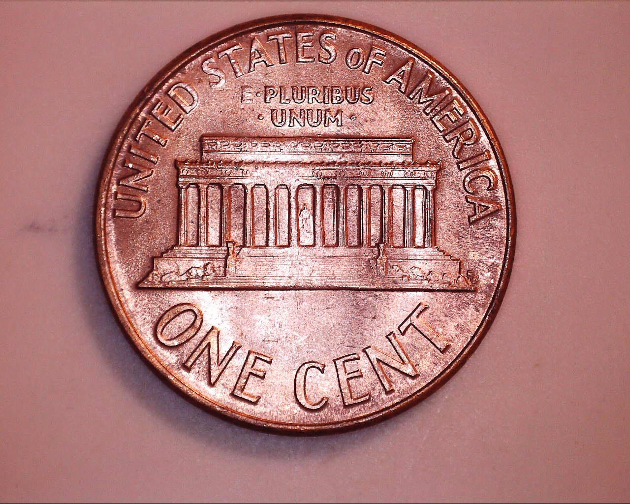 1965-Lincoln-Penny-Red-With-Split-Serif?