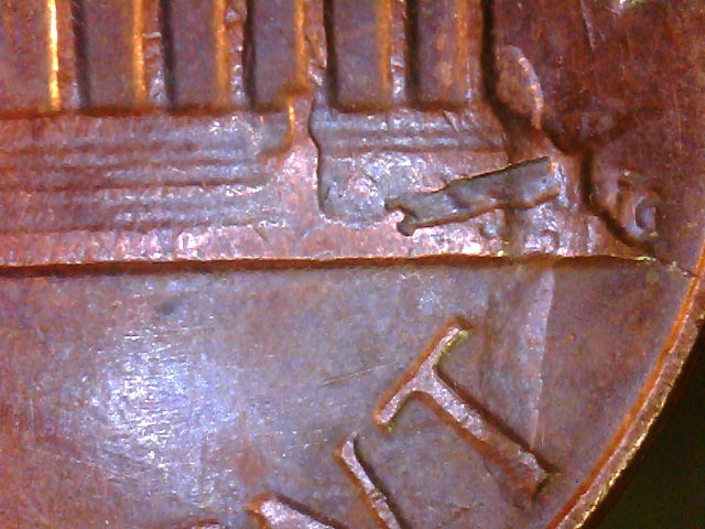 1985-P-Lc--Struct-Through-Die-Cap-Obverse-?-And-Struct-Through-Reverse