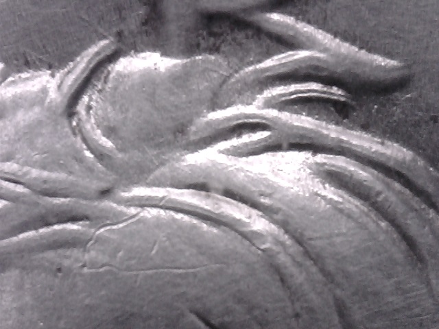 1964-D-Kennedy-Half-With-Some-Notching....common?