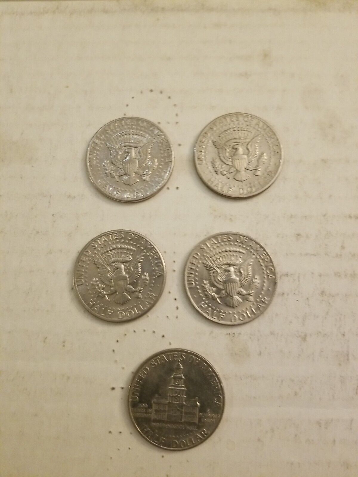 1971-D-50c-Struck-On-Quarter-Or-Silver-Planchet-?