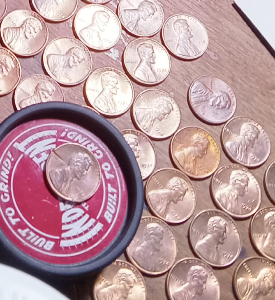 1974-P-1-Cent.-Is-This-Coin-Damaged-By-A-Feeder-Finger,-Or-Post-Mint?-Is-It-A-Denver-Minted-Coin?