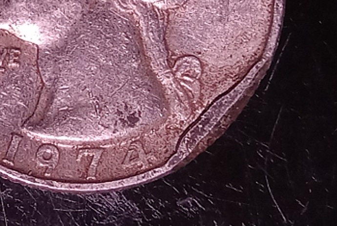 1974-P-25-Cent.-Is-This-A-Clip?
