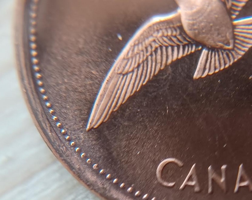 1967-Specimen-Penny-With-A-Struck-Thru-Or-Lamination-Error?