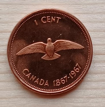 1967-Specimen-Penny-With-A-Struck-Thru-Or-Lamination-Error?