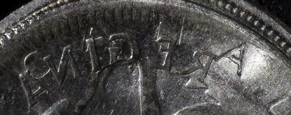 Is-This-1963-25-Cent-An-Error-Coin?-Or-A-Vise-Or-Hammer-Job?
