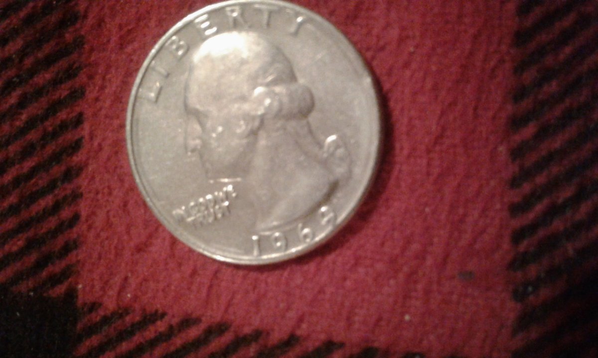 Help-With-This-Quarter,-It-Appears-To-Have-A-67-Ona69