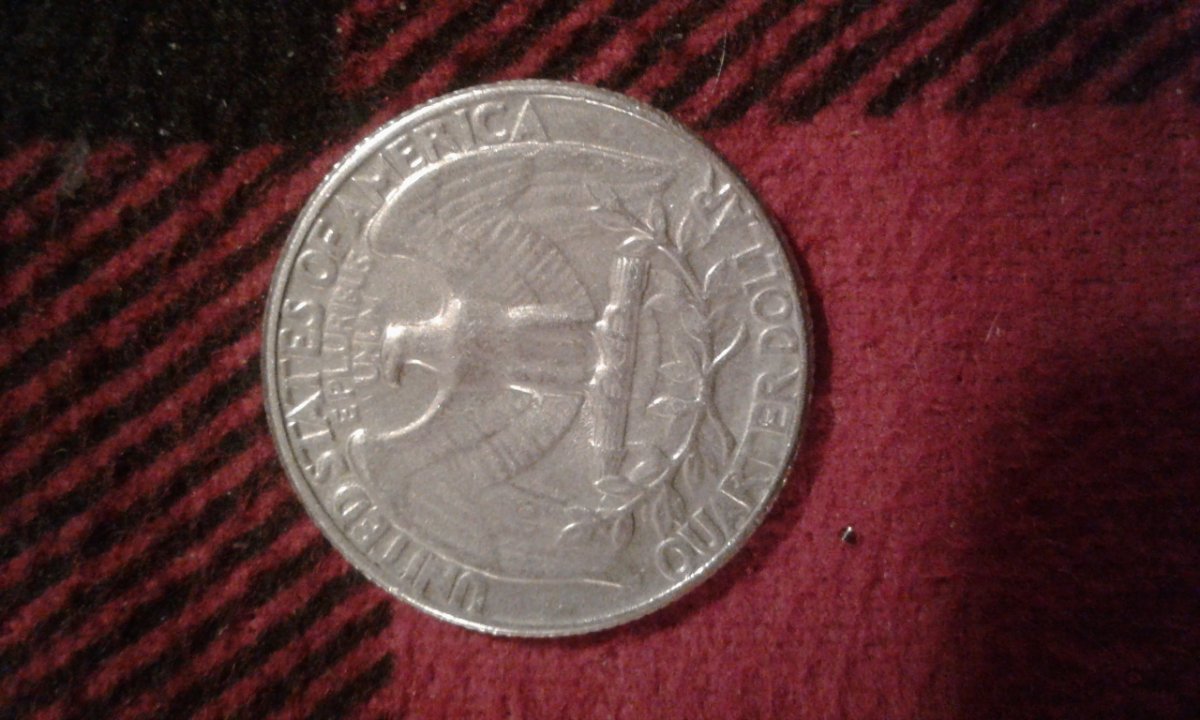 Help-With-This-Quarter,-It-Appears-To-Have-A-67-Ona69