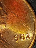 1975-Canadian-Dot-Penny-197.5.-Dot-Between-7-&-5.