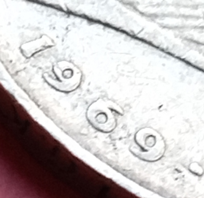 I-Have-A-Double-Date-On-This-2-Mark-Coin