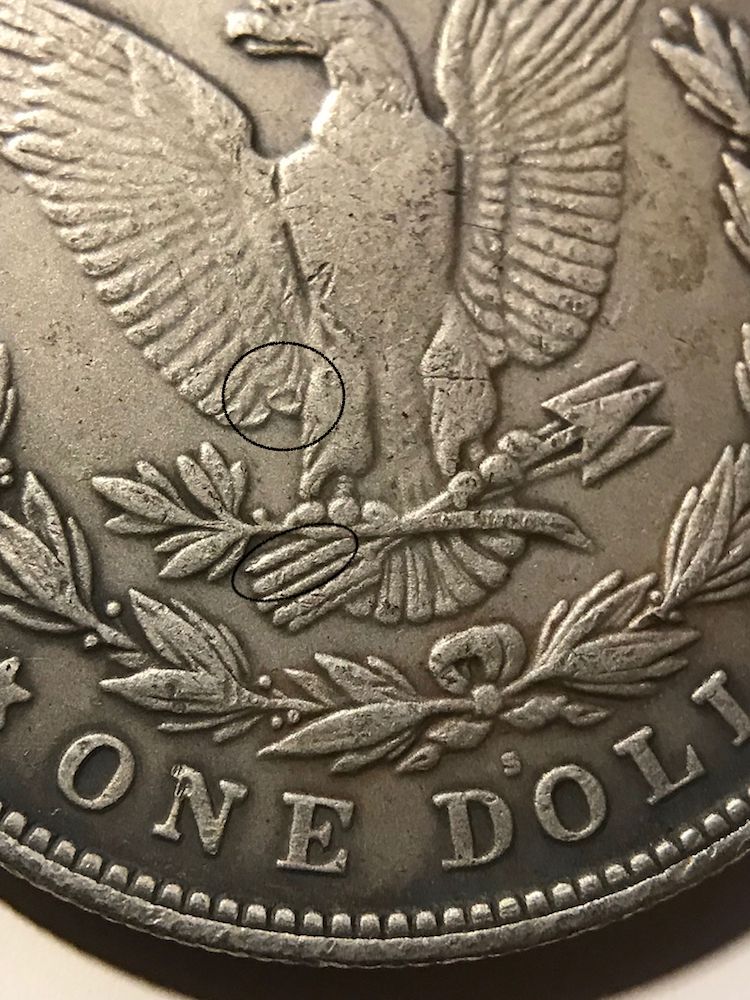 Error-On-Arrows-And-Feathers-On-An-1885-Morgan-Dollar