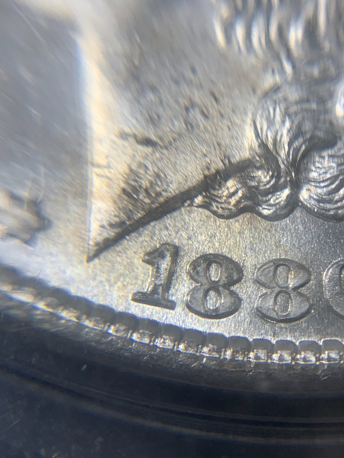 Showing-Off-A-New-Pickup.1880-S-Morgan-PCGS-MS-68-OGH