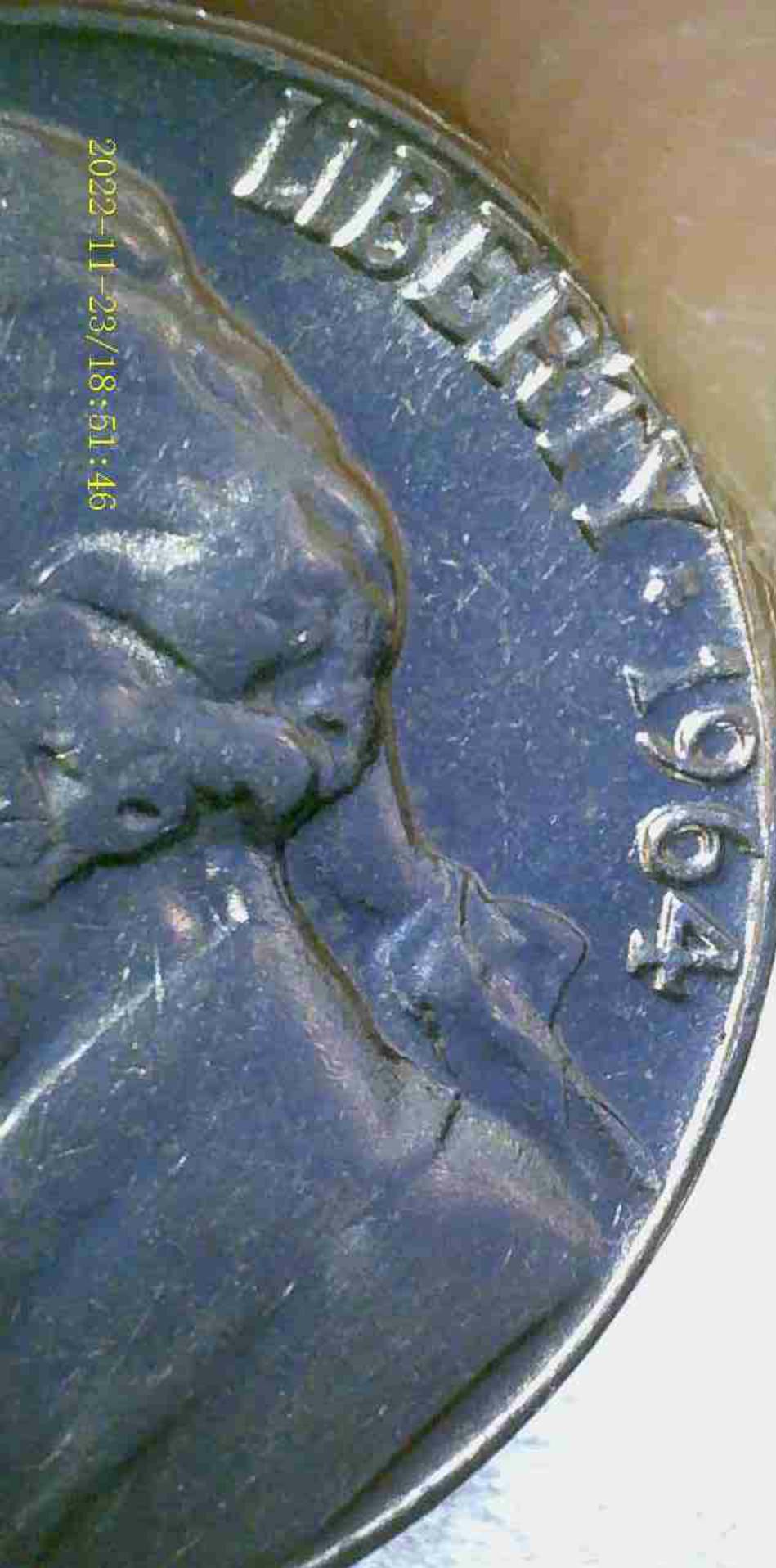 1964-D/D-Nickel-With-Possible-Double-Die-On-Date-And-Ear-But-Prob-Machine.big?is-It-Cleaned?