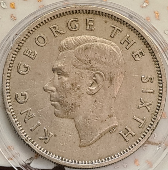 1951-New-Zealand--One-Florin-Die-Clash-Obverse-Near-Kings-Sideburn/Ear