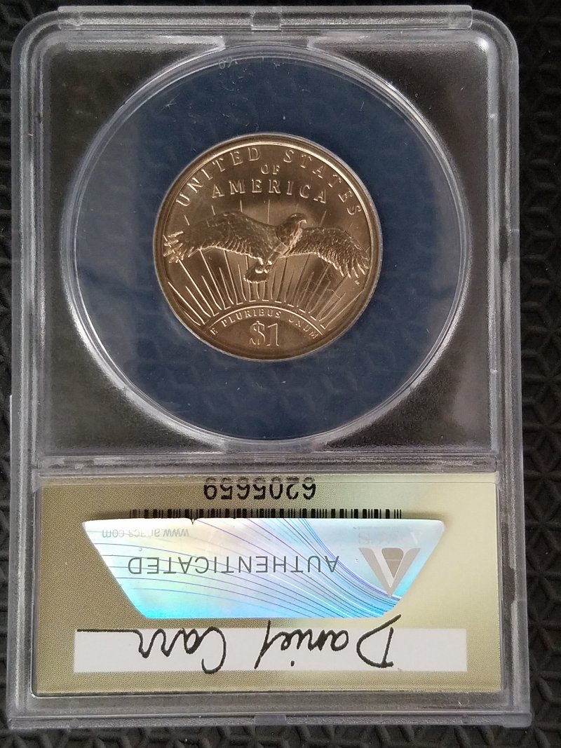 Post-A-Coin-Or-Medal-Related-To-Space-Travel.