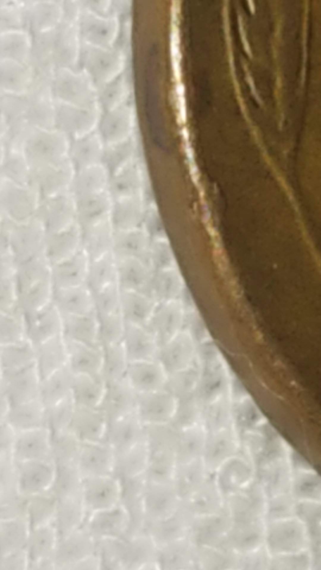 1956-Penny-With-A-Spot-On-The-Rim