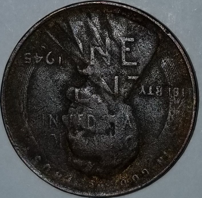 1945-S-Wheat-Error.-It-Has-The-Reverse-Struck-On-The-Obverse