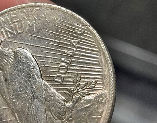 1923-Peace-Dollar-Planchet-Related-Error-Or-Damage?