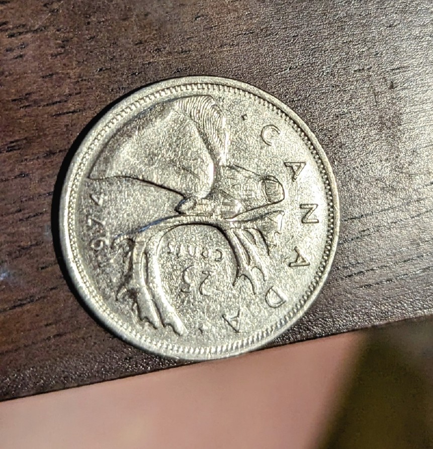 1974-25�-Coin-With-Major-Rotated-Die-Error?