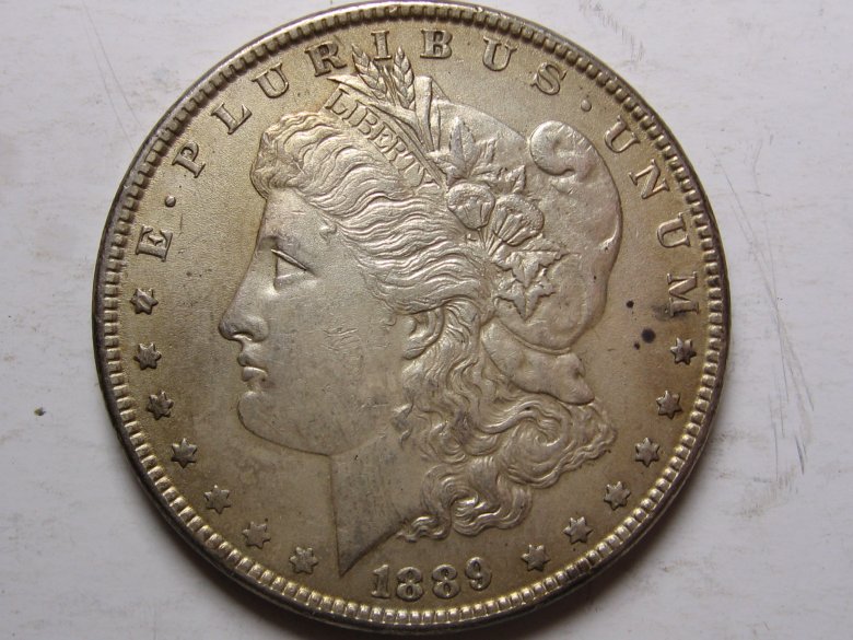 1889-Morgan-Silver-Dollar-Struck-Thru-Or-Post-Mint?